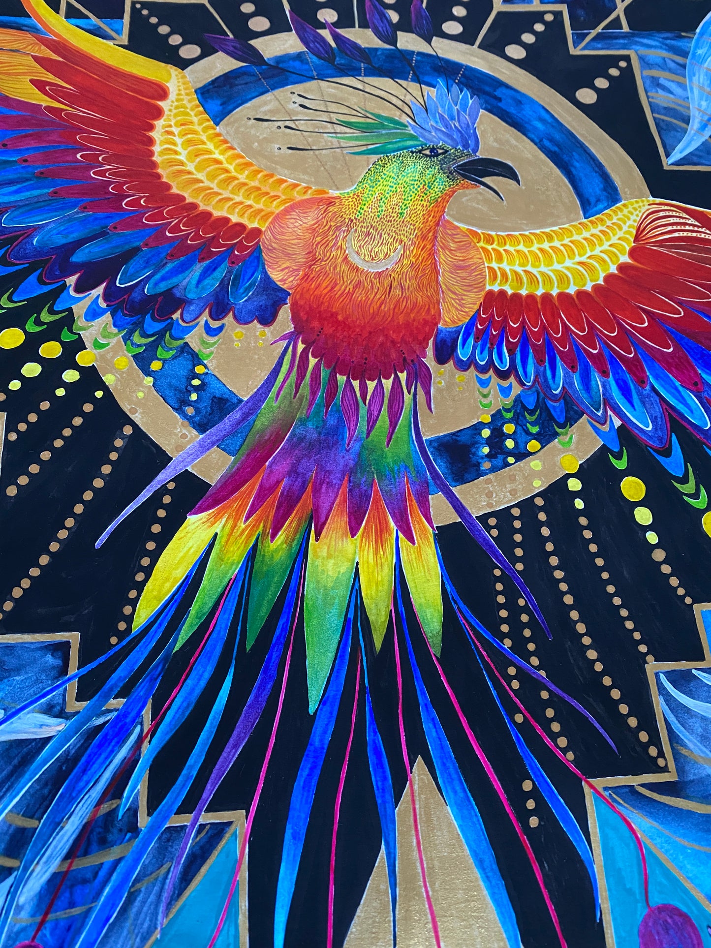 Detail of a painting, Phoenix with a lot of colours and a geometrical structure. Black, gold, on the bottom a pyramid structure with two snakes, a little egg with a new phoenix inside. beams of sky coming from Phoenix. Lots of golden dots. laurateodoriart